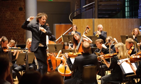 Nicholas Collon conducts the Aurora Orchestra in Objects at an Exhibition at London’s Science Museum.