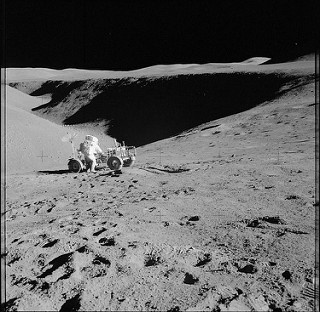 Apollo 15 astronaut with a space buggy