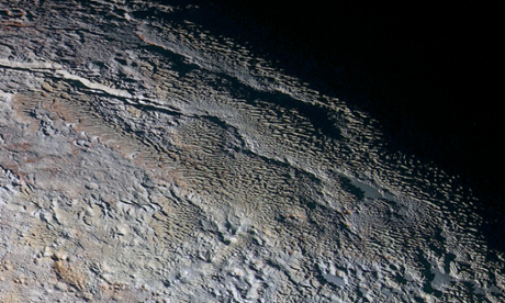 Images of Pluto and Charon continue to captivate Nasa: 'This world is alive'