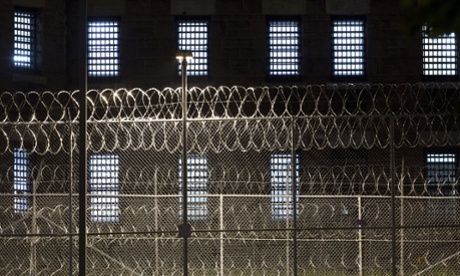 Razor wire covers a fence at the Clinton Correctional Facility, Monday, June 15, 2015 in Dannemora, N.Y. State police say more than 800 law enforcement officers are pushing on in the hunt for convicted murderers David Sweat and Richard Matt 10 days after the two escaped from the maximum-security prison in rural New York. (AP Photo/Mark Lennihan)