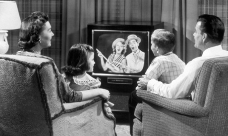 A family watching television in the 1950s.