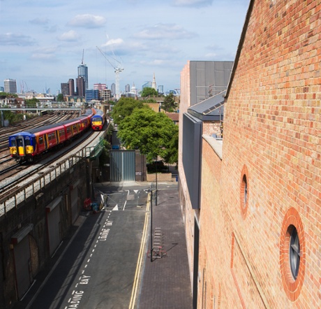 The gallery stands right next to the railway viaduct in Vauxhall, where a thicket of towers gathers on the horizon.