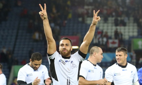 Romania's Madalin Lemnaru celebrates after beating Canada in the Rugby World Cup Pool D match at Leicester.
