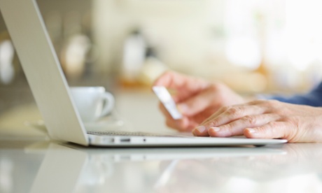 hand over laptop with credit card