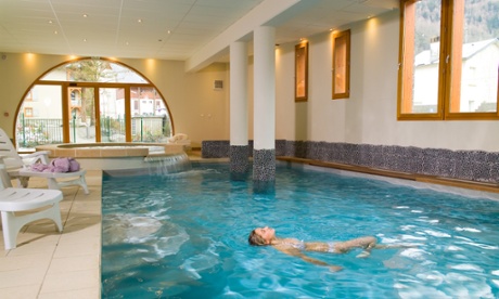 A woman in the pool relaxing at Thermes Sensoria spa, St Lary, France