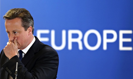 Britain's PM Cameron holds a news conference during an EU leaders summit in Brussels