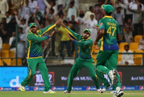 Pakistan's players celebrate after dismissing Morgan.