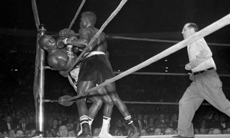 Emile Griffith, right, punches Benny Paret at Madison Square Garden in New York City, 24 March, 1962. Paret died of his injuries on 3 April.