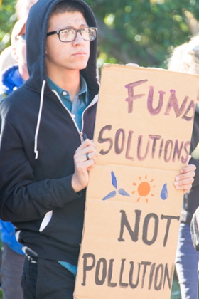 Around 100 students gathered outside the university’s main administration building demanding that divestment plans be accelerated