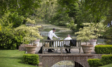 Festival-goers picnic in the Glyndebourne grounds during the main summer season.