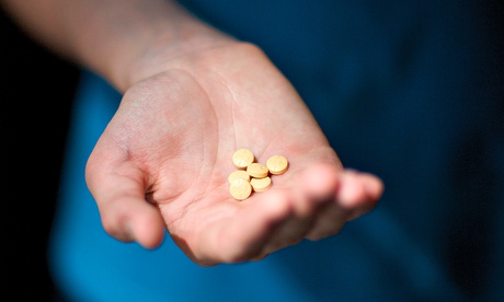 Edward holds his medication