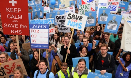 Doctors, nurses and the public protesting to save out NHS.
