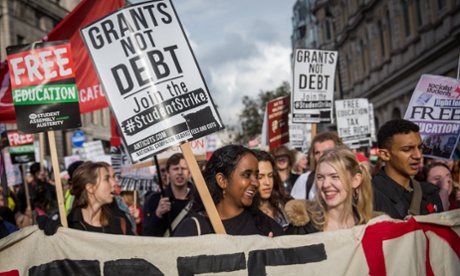 Protestors march through central London during a protest against education cuts and tuition fees on November 4, 2015 in London, England.