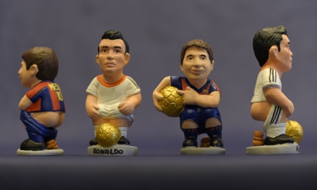 Learn something new every day dept: ceramic figurines called caganers during their presentation in Torroella de Montgri, near Gerona. Our helpful picture-captioning friends say: 'Statuettes of well-known people defecating are a strong Christmas tradition in Catalonia, dating back to the 18th century as Catalans hide caganers in Christmas Nativity scenes and invite friends to find them. The figures symbolise fertilisation, hope and prosperity for the coming year.'