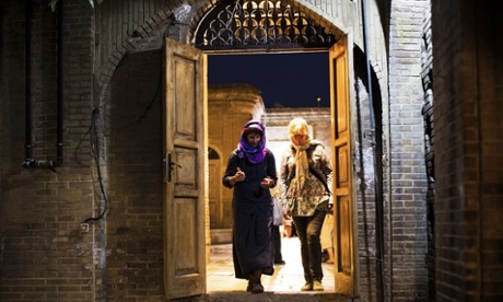 Tourists visit the tomb of Persian mystic poet Hafez in Shiraz.