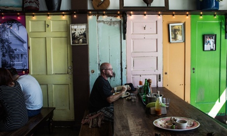 Cid Isbell having a meal at Sol Food restaurant 13 days after his surgery in San Rafael, California.