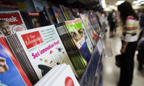 woman in front of magazine stand