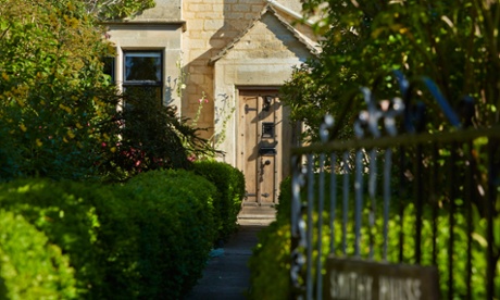 'It really is a labour of love': the outside of the house, with its honey-coloured stone and mullioned windows.