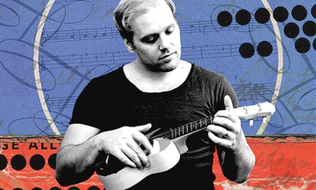 Stuart tries out his self-made ukulele.