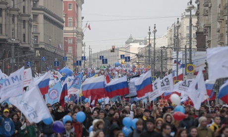 People take part in a demonstration marking the Day of Popular Unity on Tverskaya street in Moscow on Wednesday.