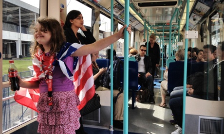 A young fan of Team USA travelling to the 2012 Olympics by DLR.