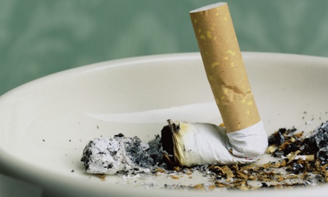 Cigarette stub in ashtray, close-up