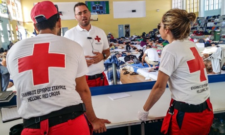 Greek Red Cross volunteers at a temporary shelter set up for refugees in Crete.