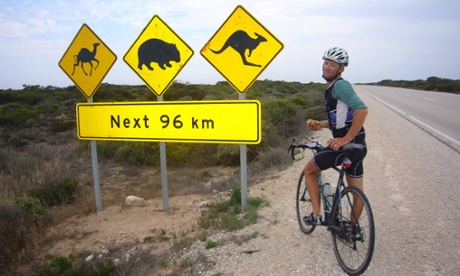 Andrew Nicholson stops for a sandwich as he crosses Australia on his round-the-world challenge.