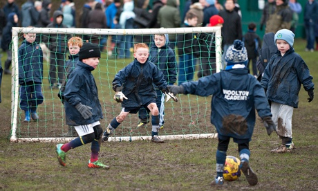 Children playing football in Liverpool
