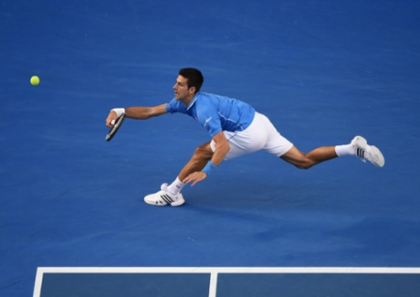 Novak Djokovic plays a shot.