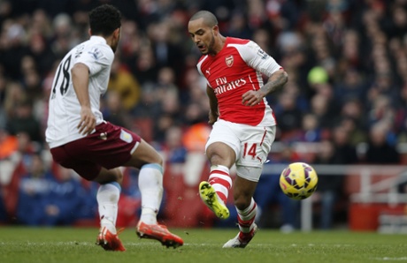 Theo Walcott scores no three for Arsenal.