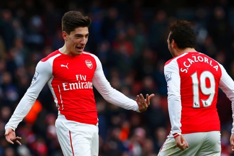 Hector Bellerin celebrates his goal with Santi Cazorla.
