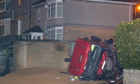Bath tipper truck lorry lies on its side after the crash