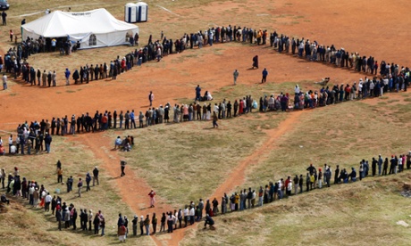 South Africans queueing to vote in democratic elections.
