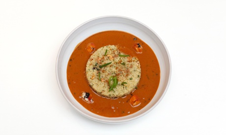 A circle of couscous with four lobster tails in a sauce at Wormwood