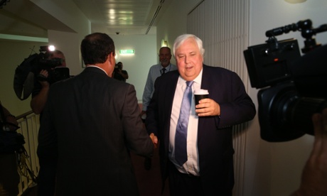 Mal Brough passes PUP leader Clive Palmer in Parliament House this morning, Tuesday 11th February