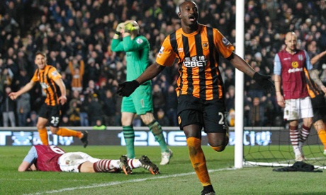 Dame N'Doye celebrates after scoring for Hull against Aston Villa.