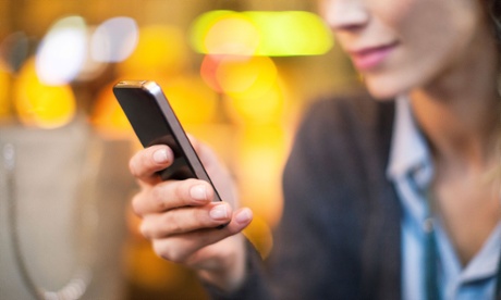 woman using an iphone