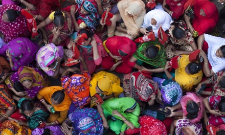 Workers of Hamim Sportswear LTD take part in a demonstration in front of National Press Club in Dhaka