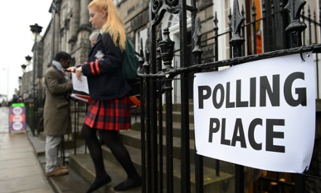 A young voter leaves a polling station after casting her vote in Edinburgh