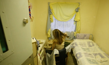 A female prisoner in her cell at Brockhill women's prison in Redditch, Worcestershire.
