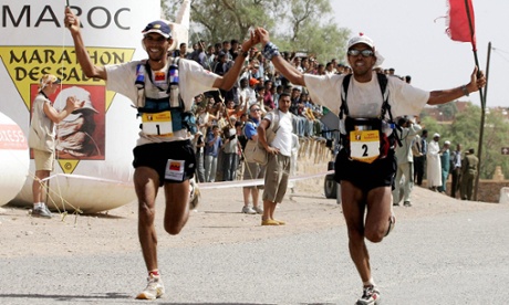 Brothers Lahcen (left) and Mohamad Ahansal finish first and second in the 2005 Marathon des Sables
