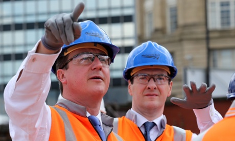 David Cameron and George Osborne tour building works at Manchester's Victoria Railway Station in June, 2014.