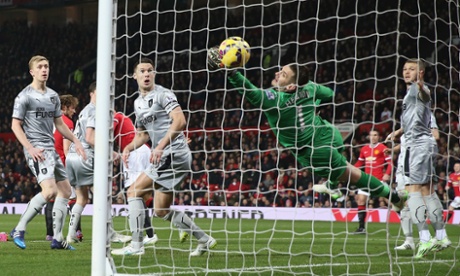 And the ball drops wide of the dive of Tom Heaton to give United the lead