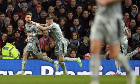 Burnley's English striker Danny Ings, left, celebrates after notching the equaliser.
