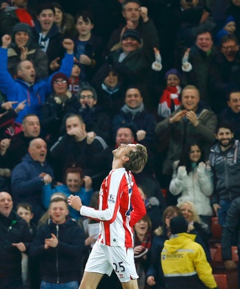 Stoke City's Peter Crouch reacts after his goal against Manchester City was disallowed