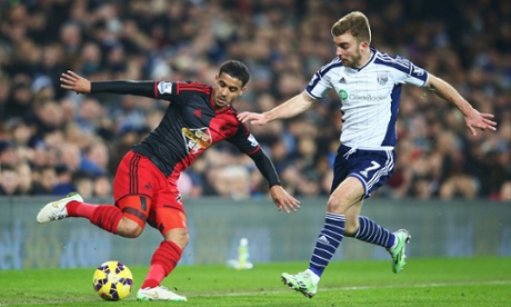 Kyle Naughton of Swansea is closed down by James Morrison of West Brom.