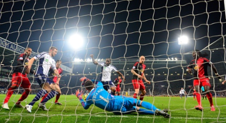 Swansea goalkeeper Lukasz Fabianski makes a goal-line save.