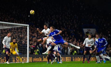John Terry of Chelsea and Phil Jagielka of Everton compete for the ball.