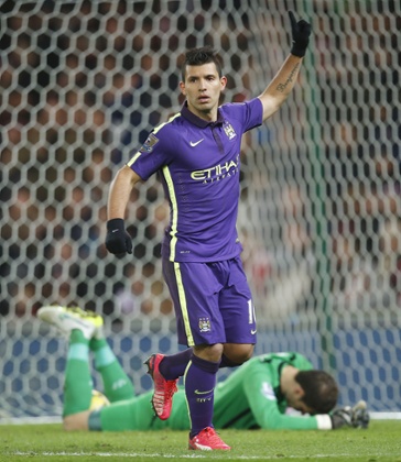 Aguero celebrates his penalty.
